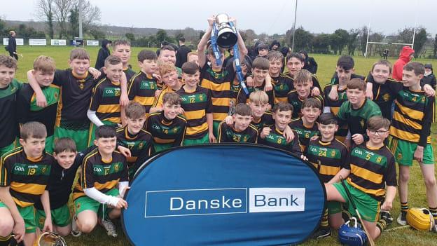 St. Mary's CBGS celebrate with the McNamee Cup. 