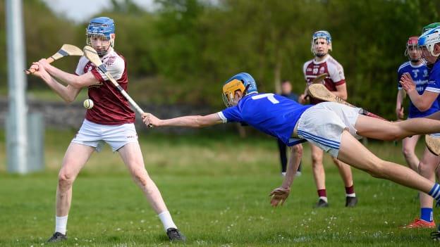 A St. Flannan's hurler pulls off a spectacular block on a Presentation Athenry player in last year's GCS Super 9s. 