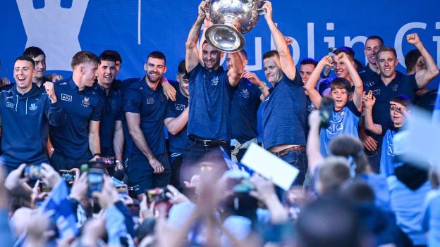 Captain James McCarthy, left, and manager Dessie Farrell lift the Sam Maguire cup during the homecoming celebrations of the Dublin All-Ireland Football Champions at Smithfield Square in Dublin. Photo by Ramsey Cardy/Sportsfile