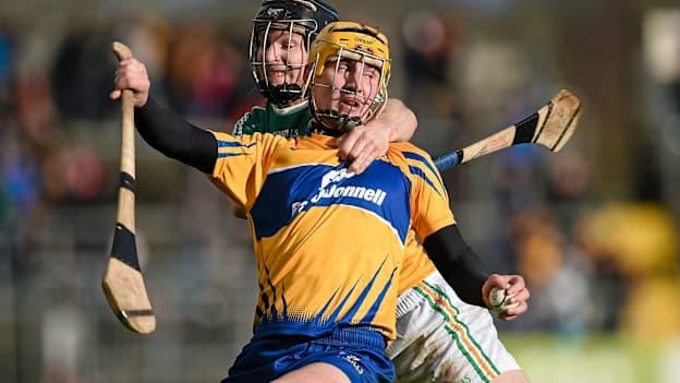 Clare player Colm Galvin is tackled by Sean Gardiner, Offaly. 