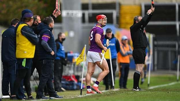 Lee Chin of Wexford prepares to come on as a substitute during the GAA Hurling All-Ireland Senior Championship Qualifier Round 2 match between Wexford and Clare at MW Hire O'Moore Park in Portlaoise, Laois. 