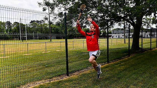 Tadhg Mác Cárthaigh, member of Ardclough GAA in Kildare, during a training session on his own next to Ardclough GAA club in June 2020. 