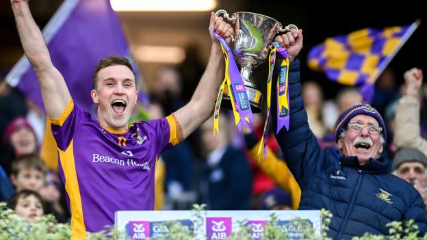 Kilmacud Crokes captain Shane Cunningham lifts the Sean McCabe cup with kitman Vinny Patterson after their side's victory in the AIB Leinster GAA Football Senior Club Championship final match between Kilmacud Crokes, Dublin, and Naas, Kildare, at Croke Park in Dublin. Photo by Stephen Marken/Sportsfile.