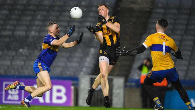Niall Mitchell of The Downs in action against goalkeeper Darragh McPartlin and Conor McGill of Ratoath during the AIB Leinster GAA Football Senior Club Championship Semi-Final match between The Downs and Ratoath at Croke Park in Dublin.