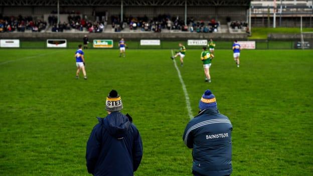 Paddy Christie and David Power watching Tipperary play against Kerry in the McGrath Cup in January.