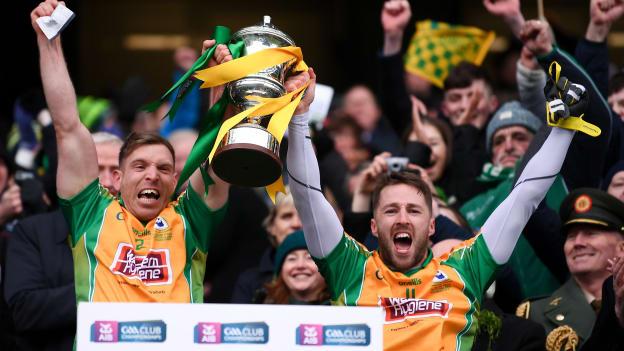 Ciaran McGrath and Micheal Lundy lift the Andy Merrigan Cup at Croke Park.
