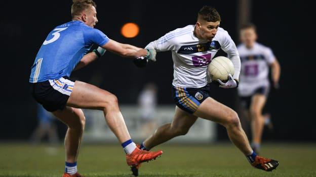 Evan O'Carroll of University College Dublin in action against Brian Power of TU Dublin City Campus during the Electric Ireland Sigerson Cup Round 3 match between UCD and TUDCC at Billings Park in UCD, Dublin. 