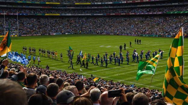 The Artane Band lead Kerry and Dublin on the pre-match parade before the drawn All Ireland SFC Final at Croke Park.