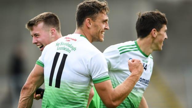 Chris Crummey of Lucan Sarsfields, centre, celebrates with team-mates Daire Newcombe, left, and Paul Crummey after the Dublin County Senior A Hurling Championship Quarter-Final match between Kilmacud Crokes and Lucan Sarsfields at Parnell Park in Dublin. 