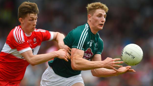 Daniel Flynn, Kildare, and Paul McNeill, Derry, in action at Owenbeg.