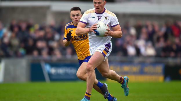 Shane Walsh, Kilmacud Crokes, and Eoin Murchan, Na Fianna, in Dublin SFC action at Parnell Park.