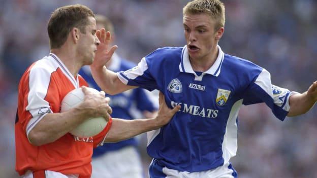 Ross Munnelly in action against Armagh's Paul McGrane in the 2003 All-Ireland SFC Quarter-Final. 