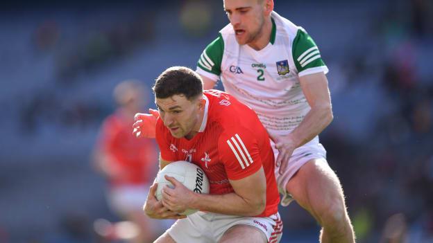Sam Mulroy, Louth, and Seán O'Dea, Limerick, in Allianz Football League Division Three Final action at Croke Park.