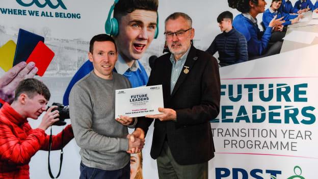 Uachtarán Chumann Lúthchleas Gael Larry McCarthy presents a plaque to Virginia College, Cavan, Future Leader Co-ordinator Ronan Flanagan during a GAA PDST Future Leaders promotion event at Croke Park.