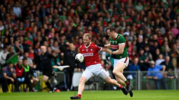 Ruairi Deane, Cork, and Matthew Ruane, Mayo, in All-Ireland SFC action. Photo by Eóin Noonan/Sportsfile