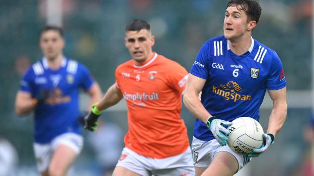 Oisin Kiernan, Cavan, and Greg McCabe, Armagh, in Ulster SFC action. Photo by Stephen McCarthy/Sportsfile
