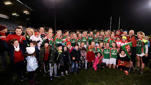 Carnacon players and supporters celebrate at Parnell Park.