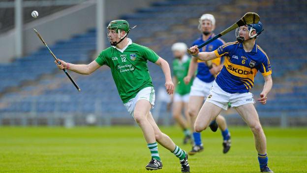 David Reidy, Limerick, and Tomas Hamill, Tipperary, in Munster U21 Championship action in 2013. Photo by Matt Browne/Sportsfile