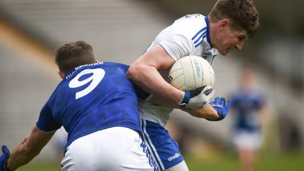 Darren Hughes, Monaghan, and Killian Clarke, Cavan, in Allianz Football League action at St Tiernach's Park.