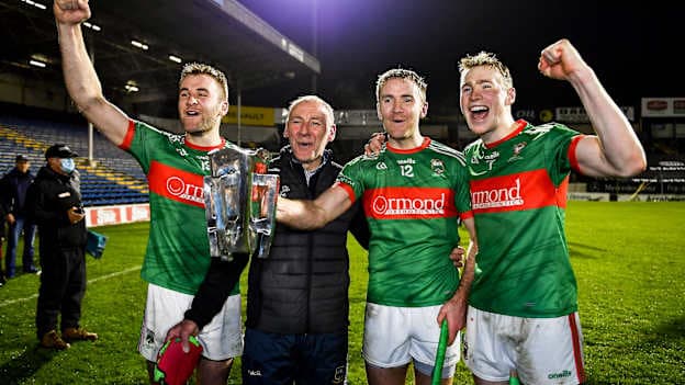 The McGrath family, from left, John, Pat, Noel and Brian celebrate with the trophy after their side's victory in the Tipperary County Senior Club Hurling Championship Final Replay match between Thurles Sarsfields and Loughmore/Castleiney at Semple Stadium in Thurles, Tipperary. 