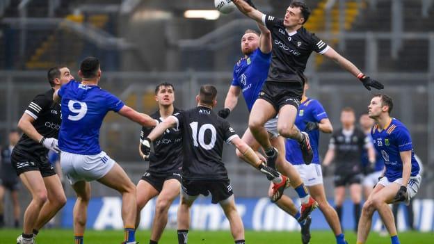 Eoin Murtagh of Wicklow and Cian Lally of Sligo contest a high ball during the Allianz Football League Division 4 Final match between Sligo and Wicklow at Croke Park in Dublin.