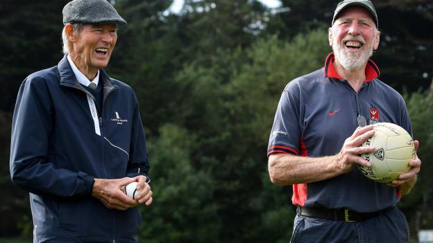 Mícheál Ó Muircheartaigh with former Dublin footballer Brian Mullins during the reunion of club and intercounty GAA players trained by Mícheál Ó Muircheartaigh as part of a training group of Dublin based players in the 1970, '80's and '90's at UCD in Belfield, Dublin.
