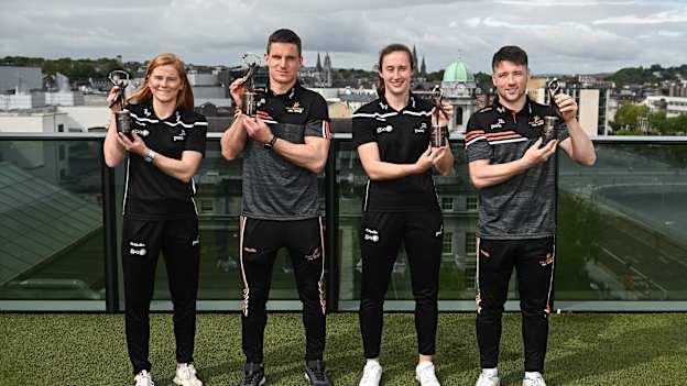 PwC GAA/GPA Players of the Month for April, from left, Waterford Camogie player Beth Carton, Clare hurler John Conlon, Kerry footballer Kayleigh Cronin and Clare footballer Keelan Sexton with their awards at PwC offices in Cork. Photo by Eóin Noonan/Sportsfile