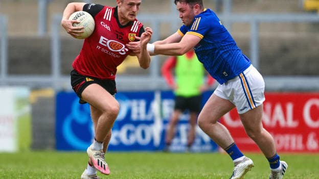 Liam Kerr, Down, and Peter Lynn, Longford, in Tailteann Cup action at Páirc Esler. Photo by Daire Brennan/Sportsfile