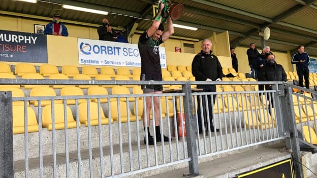 Setanta captain, Declan Coulter, lifts the cup after his team's victory over St. Eunan's in the Donegal SHC Final. 