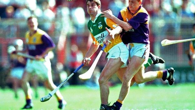 Offaly's Michael Duignan and Wexford's Rod Guiney contest for the ball in the 1996 Leinster SHC Final. 
