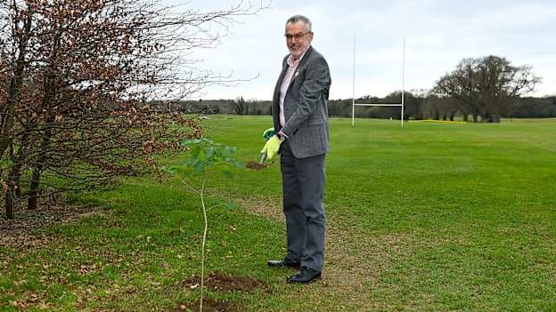 Uachtarán Chumann Lúthchleas Gael Larry McCarthy planting a native oak at Malahide Castle grounds in Dublin.