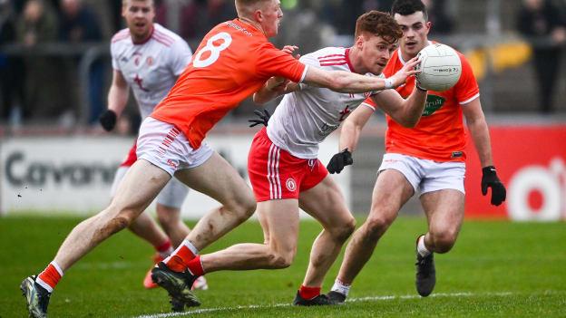 Conor Meyler, Tyrone, and Ciaran Mackin, Armagh, collide at O'Neill's Healy Park in the Dr McKenna Cup.