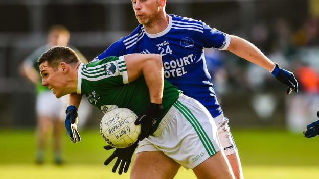Kevin Cassidy, Gaoth Dobhair, and Anthony Thompson, Naomh Conaill, during the Donegal SFC Final.