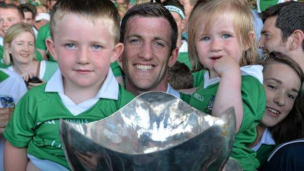 Limerick captain Donal O'Grady holds the cup, along with his children Danny and Anna after victory over Cork in the 2013 Munster SHC Final. 