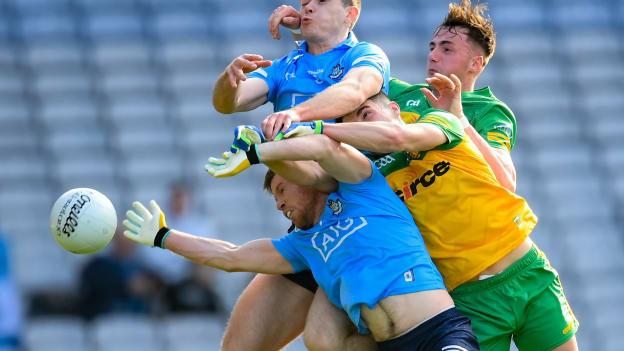 Robert McDaid and Brian Fenton, centre, of Dublin in action against Ódhrán McFadden Ferry and Jason McGee, right, of Donegal during the Allianz Football League Division 1 match between Dublin and Donegal at Croke Park in Dublin. 
