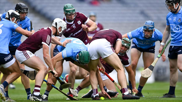 Players contest possession during the 2021 Leinster GAA Hurling Senior Championship Semi-Final match between Dublin and Galway at Croke Park in Dublin.
