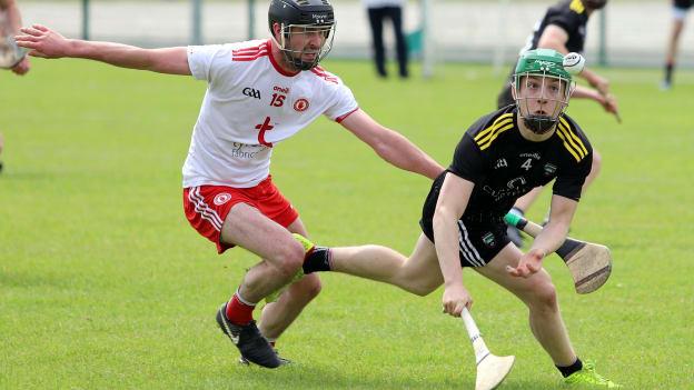 Sligo hurler, Kevin O'Kennedy, in action against Tyrone's Bryan McGurk.