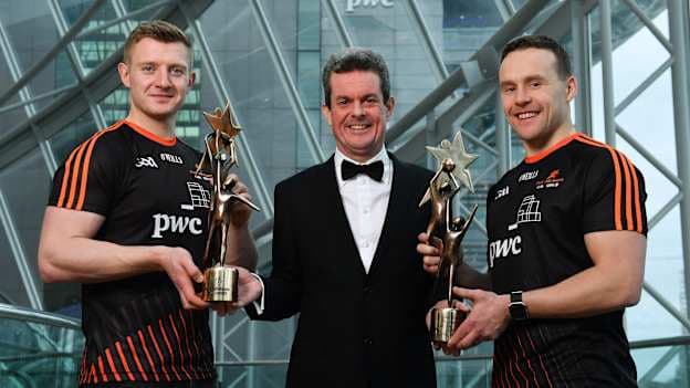 Joe Canning, Galway, and Andy Moran, Mayo, presented with their PwC GAA/GPA Hurler and Footballer of the Year awards by Feargal O Rourke, Managing Partner, PwC.