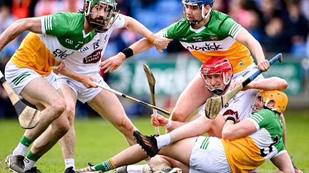 Kildare's Brian Byrne and James Burke in action against Offaly players Ben Conneely, Adrian Cleary and Ciarán Burke this afternoon.  