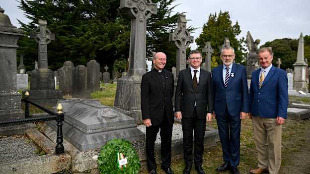 Uachtarán Chumann Lúthchleas Gael Larry McCarthy, second from right, in the company of from left, Monsignor Eoin Thynne, Ard Stiúrthóir of the GAA Tom Ryan and Manager of the Michael Cusack Centre Tim Madden, after placing a wreath on the grave of Michael Cusack at Glasnevin cemetery in Dublin, in a ceremony marking the 175th anniversary of the birth of the Clare school teacher who played a pivotal role in the formation of the GAA in 1884. 
