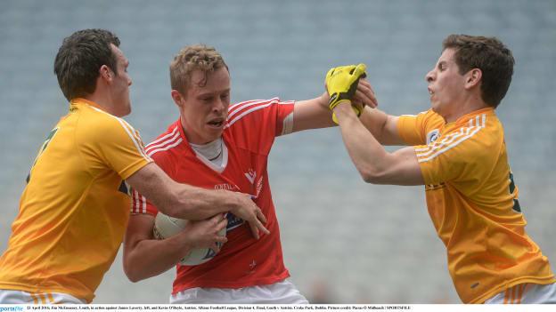 Jim McEneaney holds off Kevin O Boyle and James Laverty.