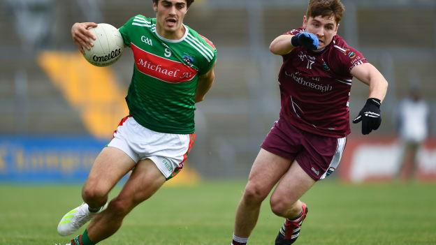 Aiden McCarthy, Kilmurry-Ibrickane, and Michael O'Neill, Lissycasey, in action at Cusack Park in the Clare SFC on Saturday.