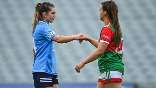 Martha Byrne of Dublin and Amy Dowling of Mayo bump fists after the Lidl Ladies National Football League Division 1 semi-final match between Dublin and Mayo at LIT Gaelic Grounds in Limerick. 