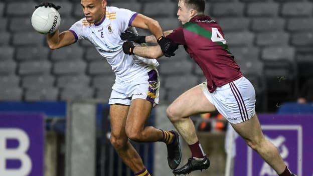 Craig Dias, Kilmacud Crokes, and Alex Mohan, Portarlington, in AIB Leinster Club SFC semi-final action at Croke Park.