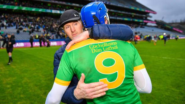 Dunloy Cuchullains manager Gregory O'Kane embraces midfielder Eoin McFerran at Croke Park.