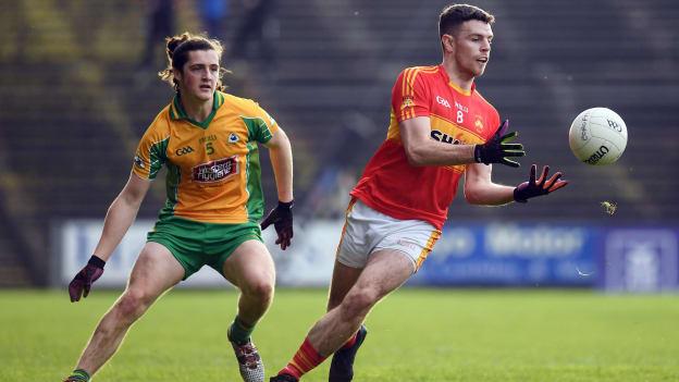 Aidan Walsh, Castlebar Mitchels, and Kieran Molloy, Corofin, in action at Elverys MacHale Park.