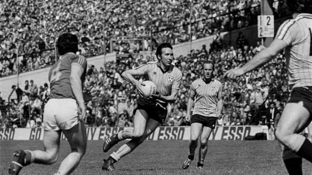Anton O'Toole of Dublin, supported by team-mate Brian Mullins, in action against Padraig Lyons of Meath during the Leinster Senior Football Championship quarter-final match between Dublin and Meath at Croke Park in Dublin. 