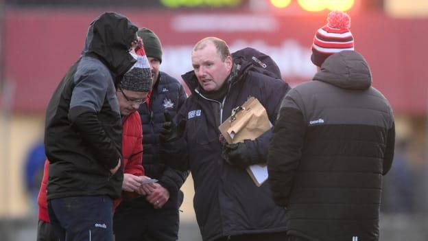 Cork manager Keith Ricken speaks to members of his backroom team at half-time of the McGrath Cup group A match between Clare and Cork at Hennessy Memorial Park in Miltown Malbay, Clare. 