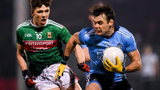 Kevin McManamon of Dublin in action against Fergal Boland of Mayo during the Allianz Football League Division 1 Round 2 match between Mayo and Dublin at Elverys MacHale Park in Castlebar, Mayo. 