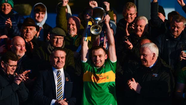 Glen captain Connor Carville lifts the cup after the AIB Ulster GAA Football Senior Club Championship Final match between Glen Watty Graham's of Derry and Kilcoo of Down at the Athletics Grounds in Armagh.